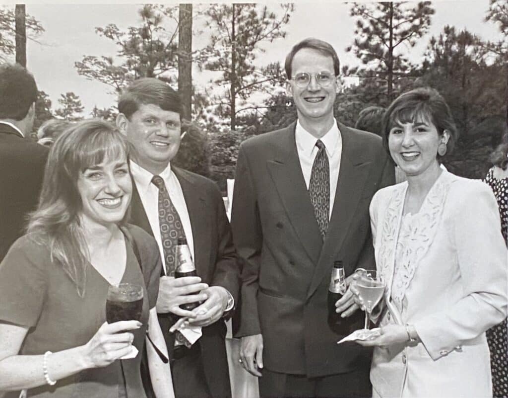 orthodontist dr. clifton and dr. chuck with friends at a cocktail party in UNC