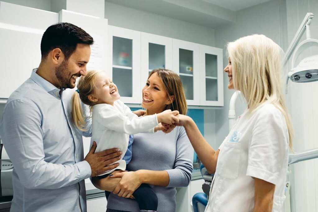 Family talks to their children and dental staff about child-friendly anesthesia