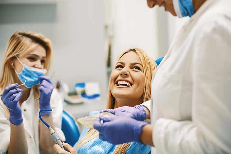 woman recieving general dentistry