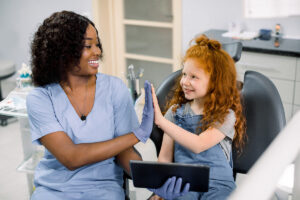 a pediatric dentist meets with a new client