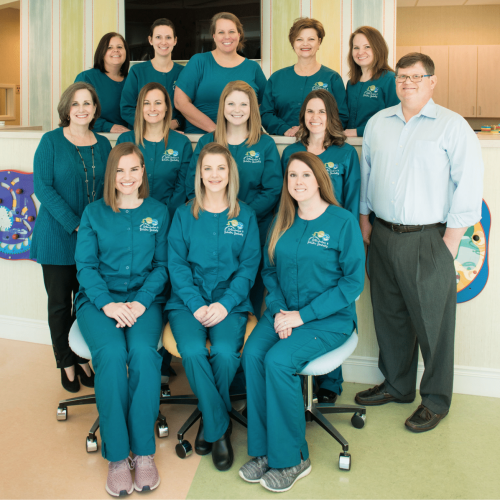 The Clifton & Mauney care team. All are dressed in teal scrubs.